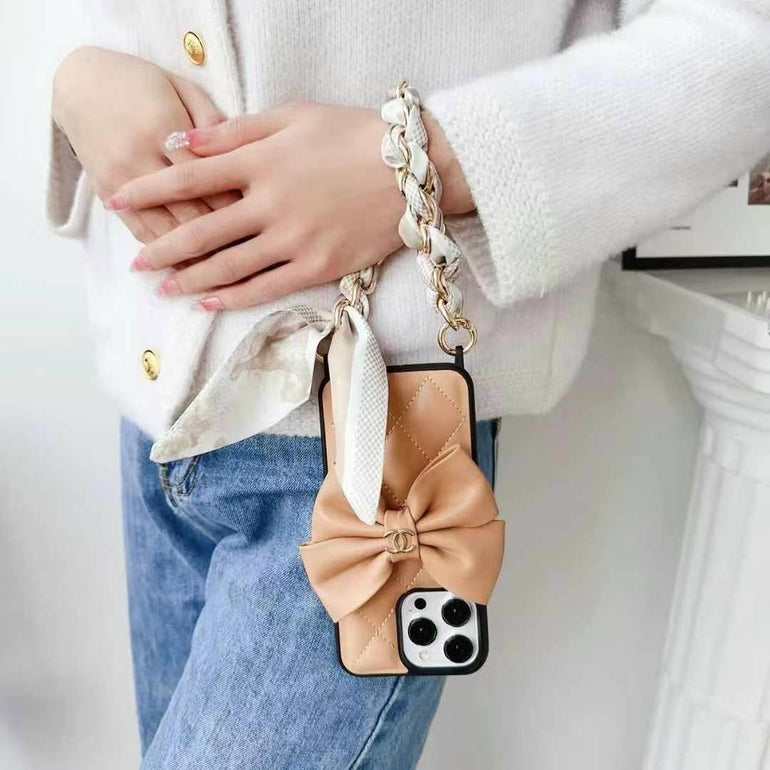 Luxury Branded Quilted Leather Bow iPhone Case With Hand Bracelet pink