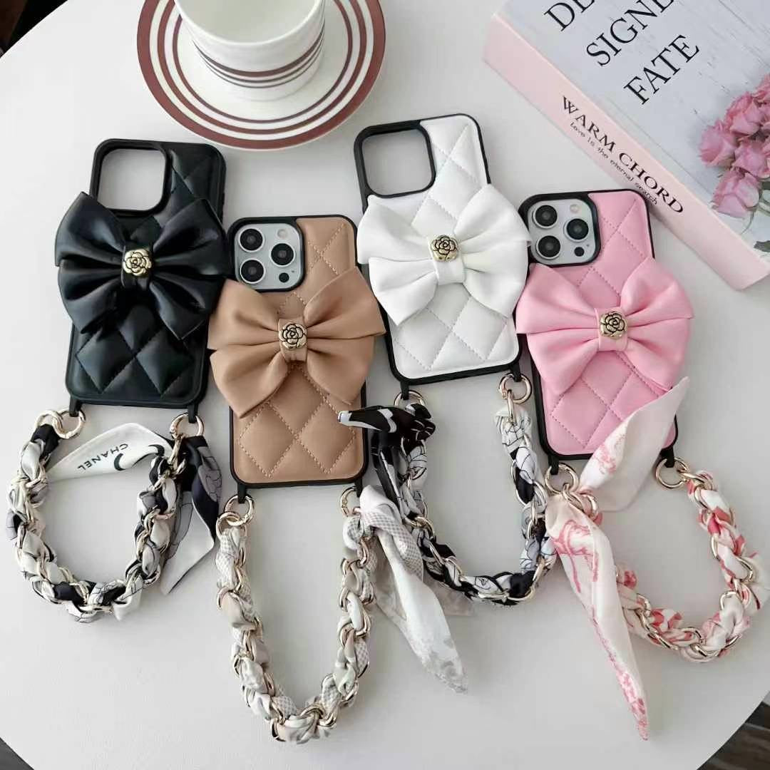 Luxury Branded Quilted Leather Bow iPhone Case With Hand Bracelet pink